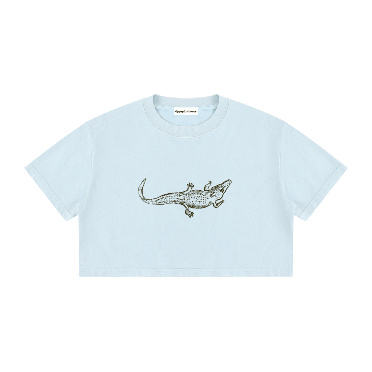 Close-up of the alligator graphic on the Light Blue Mineral Wash Crop T-Shirt.