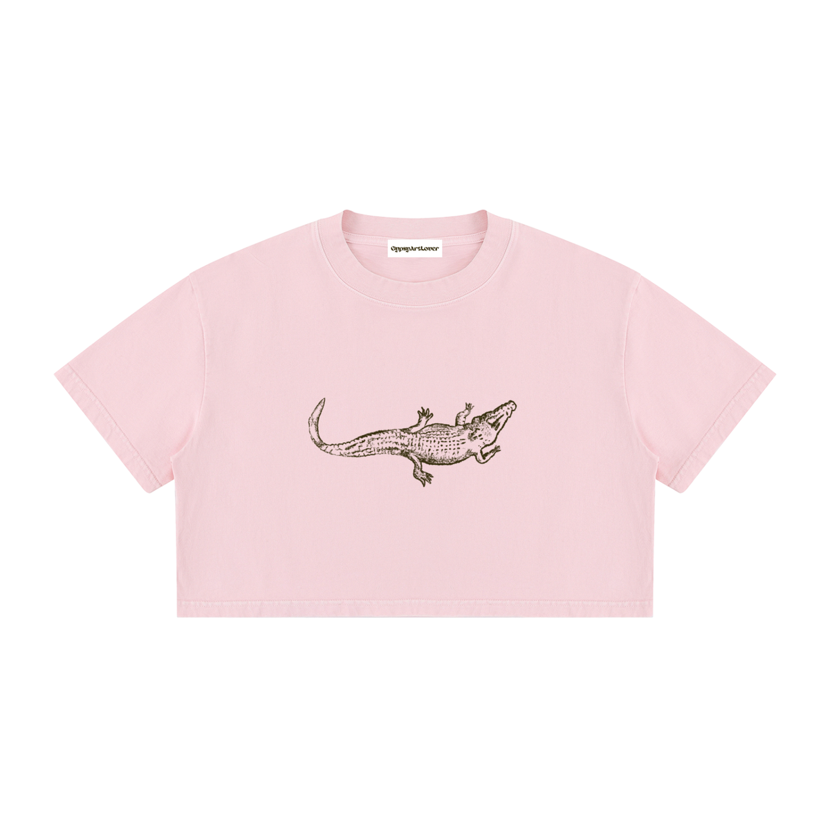 Close-up of the alligator graphic on the Pink Mineral Wash Crop T-Shirt.